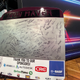 Piece of the car from the Iron Maven project with every female participant's signature